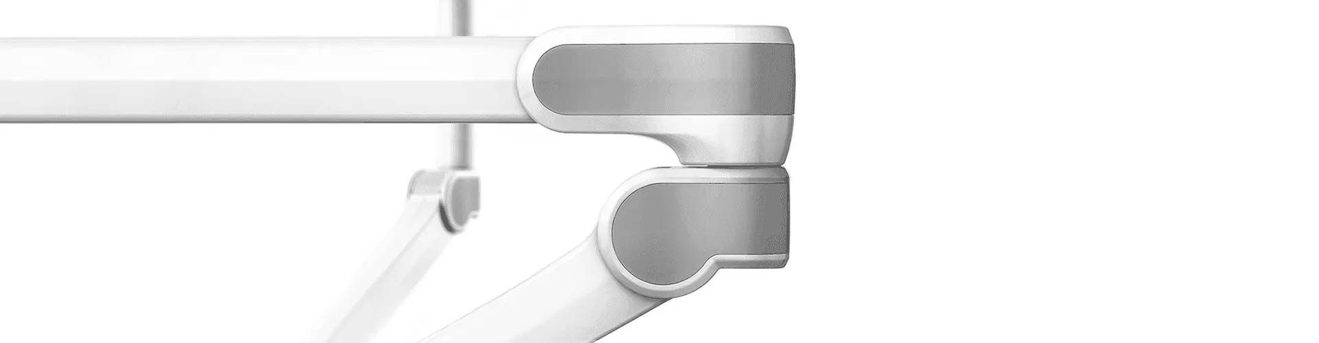 VALIA Medizindesign Nahaufnahme: Ondal Pendelarm-Gelenk mit polierter Aluminium-Endkappe auf Weiß